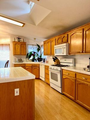 Interior, Kitchen, Tile Countertops, Wood Texture Flooring