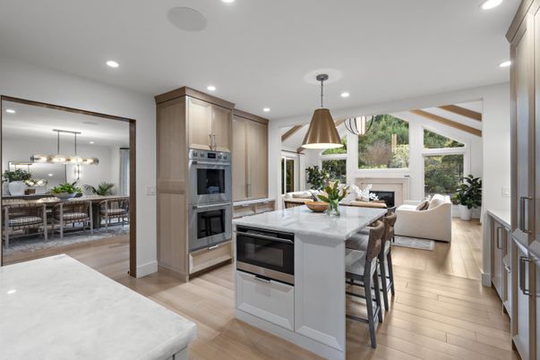 Dining room, Fireplace, Interior, Kitchen, Living room, Pendant Lights, Recessed Lighting, Stainless Steel Appliances, Wood Texture Flooring