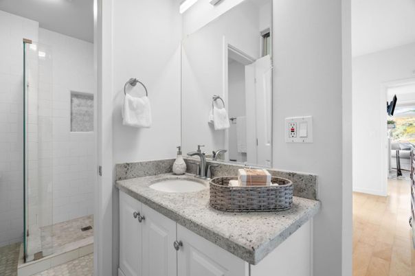 Bathroom, Dual Sink Vanities, Glass Shower, Interior, Wood Texture Flooring