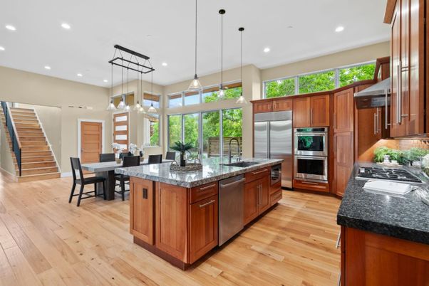 Dining room, Interior, Kitchen, Pendant Lights, Recessed Lighting, Stainless Steel Appliances, Wood Texture Flooring