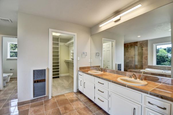 Bathroom, Dual Sink Vanities, Interior, Recessed Lighting, Tile Countertops, Walk-in Closets