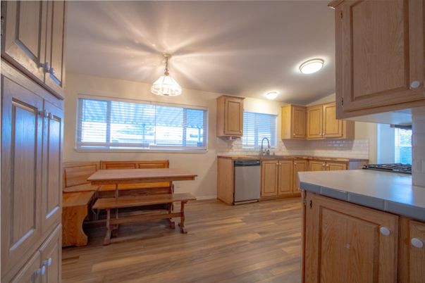 Dining room, Interior, Kitchen, Tile Countertops, Wood Texture Flooring