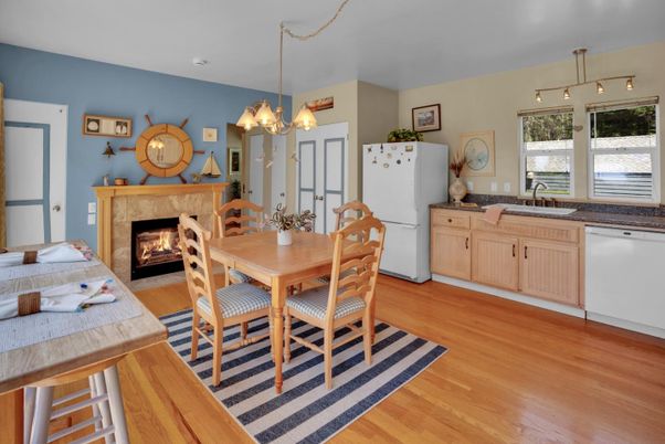 Dining room, Fireplace, Interior, Kitchen, Pendant Lights, Wood Texture Flooring