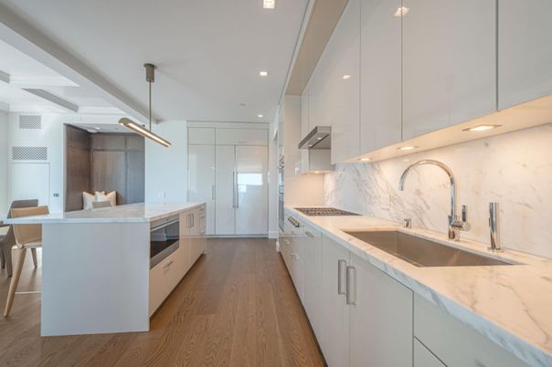 Interior, Kitchen, Marble Walls, Pendant Lights, Recessed Lighting, Stainless Steel Appliances, Wood Texture Flooring