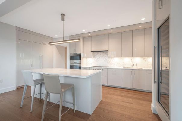 Interior, Kitchen, Marble Walls, Pendant Lights, Recessed Lighting, Stainless Steel Appliances, Wood Texture Flooring
