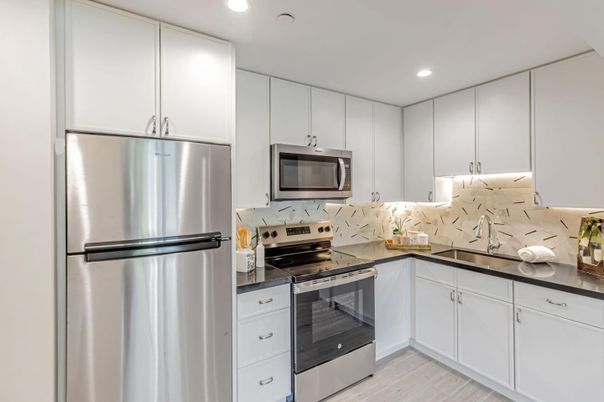 Interior, Kitchen, Recessed Lighting, Stainless Steel Appliances, Wood Texture Flooring