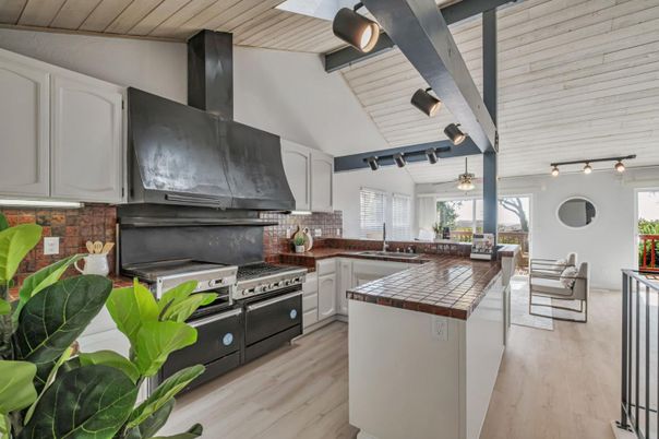 Interior, Kitchen, Stainless Steel Appliances, Tile Countertops, Wood Texture Flooring