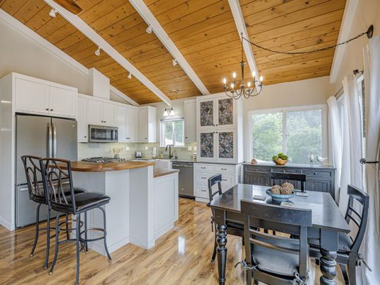 Chandelier, Dining room, Interior, Kitchen, Stainless Steel Appliances, Wooden Ceilings, Wood Texture Flooring