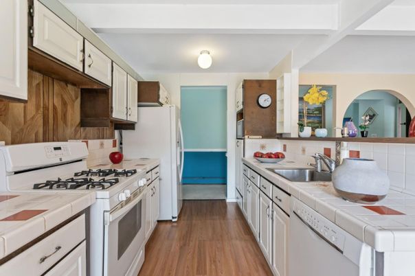 Interior, Kitchen, Tile Countertops, Wood Texture Flooring