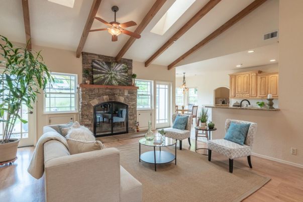 Dining room, Fireplace, Interior, Living room, Pendant Lights, Recessed Lighting, Stone Walls, Wooden Beams, Wood Texture Flooring