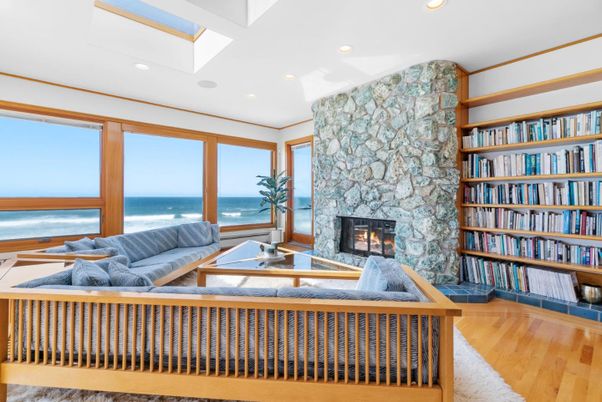 Fireplace, Interior, Living room, Recessed Lighting, Stone Walls, Water, Wood Texture Flooring