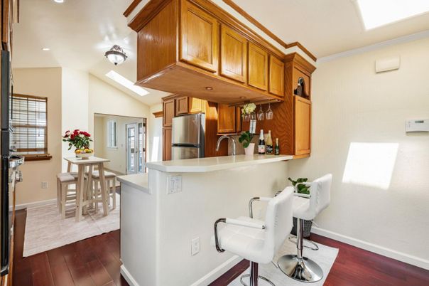 Dining room, Interior, Kitchen, Recessed Lighting, Stainless Steel Appliances, Wood Texture Flooring
