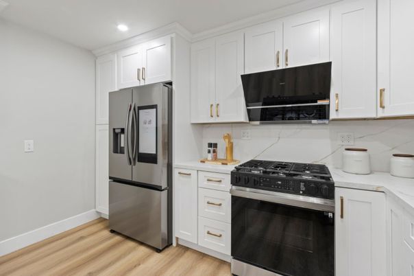 Interior, Kitchen, Recessed Lighting, Stainless Steel Appliances, Wood Texture Flooring