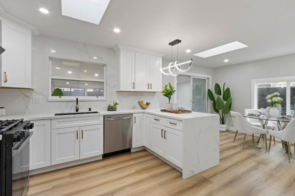 Dining room, Interior, Kitchen, Marble Walls, Pendant Lights, Recessed Lighting, Stainless Steel Appliances, Wood Texture Flooring