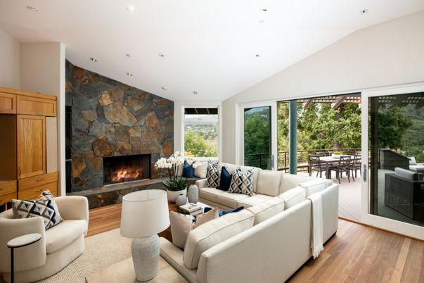 Fireplace, Interior, Living room, Recessed Lighting, Stone Walls, Wood Texture Flooring
