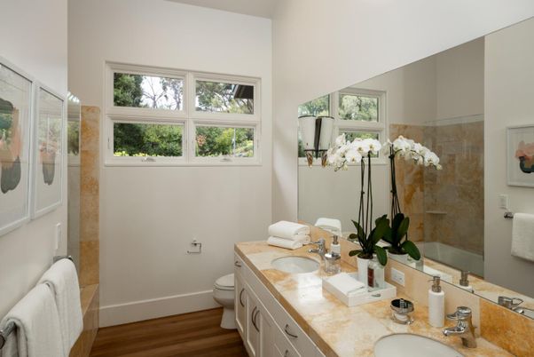 Bathroom, Dual Sink Vanities, Glass Shower, Interior, Wood Texture Flooring