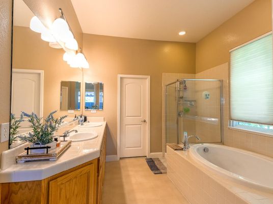 Bathroom, Dual Sink Vanities, Glass Shower, Interior, Recessed Lighting, Tile Countertops