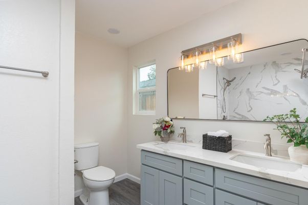 Bathroom, Dual Sink Vanities, Interior, Marble Walls, Wood Texture Flooring