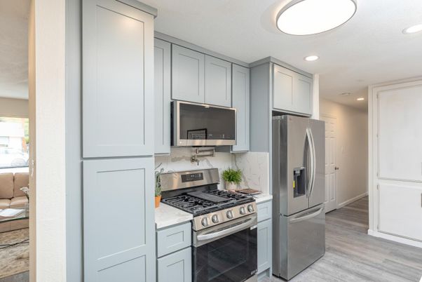 Interior, Kitchen, Recessed Lighting, Stainless Steel Appliances, Wood Texture Flooring