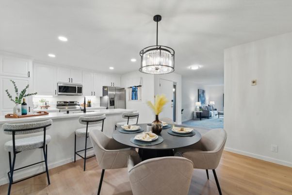 Chandelier, Dining room, Interior, Kitchen, Pendant Lights, Recessed Lighting, Stainless Steel Appliances, Wood Texture Flooring
