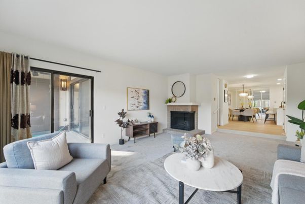 Dining room, Fireplace, Interior, Living room, Pendant Lights, Recessed Lighting, Wood Texture Flooring