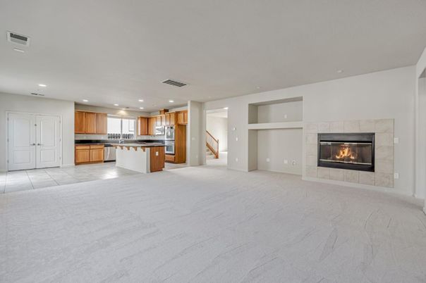 Empty room, Fireplace, Interior, Kitchen, Recessed Lighting, Stainless Steel Appliances