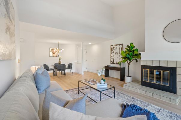 Dining room, Fireplace, Interior, Living room, Pendant Lights, Recessed Lighting, Wood Texture Flooring