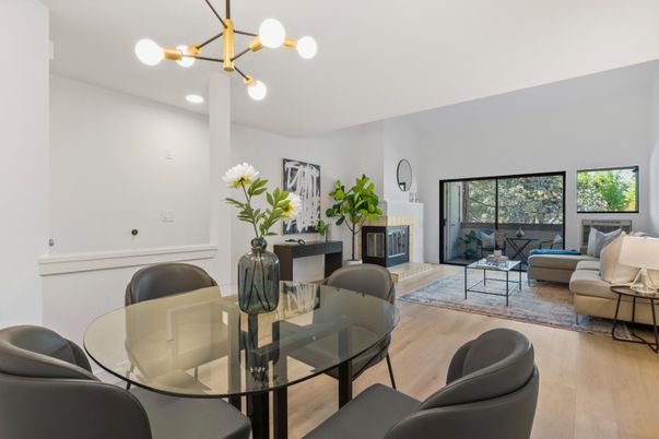 Dining room, Fireplace, Interior, Living room, Pendant Lights, Recessed Lighting, Wood Texture Flooring