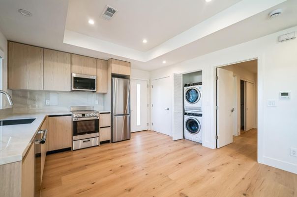 Interior, Kitchen, Recessed Lighting, Stainless Steel Appliances, Washer, Wood Texture Flooring