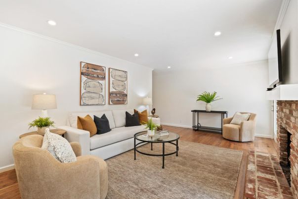 Fireplace, Interior, Living room, Recessed Lighting, Stone Walls, Wood Texture Flooring