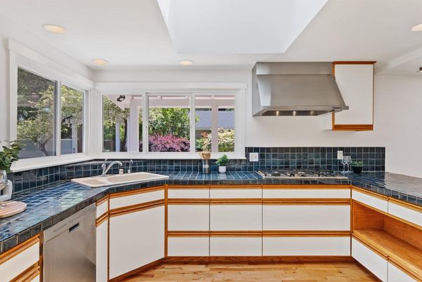 Interior, Kitchen, Recessed Lighting, Tile Countertops, Wood Texture Flooring