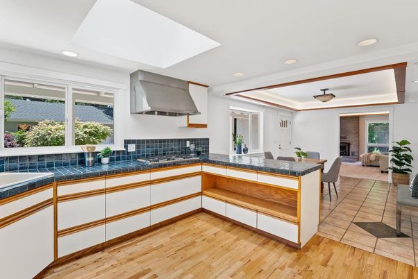 Interior, Kitchen, Recessed Lighting, Tile Countertops, Wood Texture Flooring