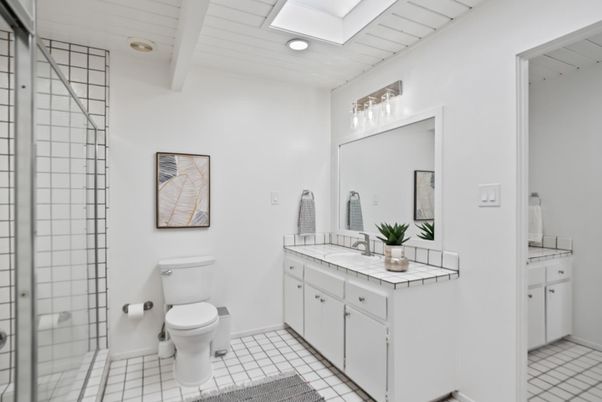 Bathroom, Dual Sink Vanities, Glass Shower, Interior, Recessed Lighting, Tile Countertops