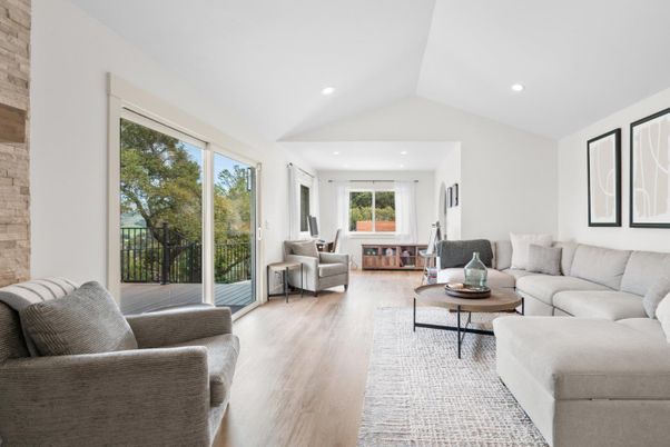 Fireplace, Interior, Living room, Recessed Lighting, Stone Walls, Wood Texture Flooring