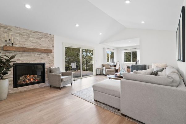 Fireplace, Interior, Living room, Recessed Lighting, Stone Walls, Wood Texture Flooring