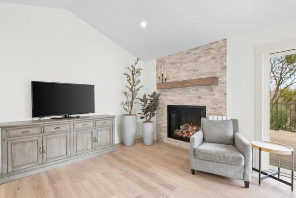 Fireplace, Interior, Recessed Lighting, Stone Walls, Wood Texture Flooring