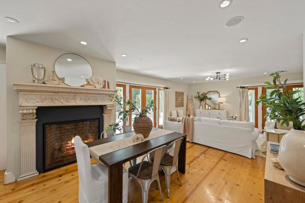 Dining room, Fireplace, Interior, Living room, Recessed Lighting, Wood Texture Flooring