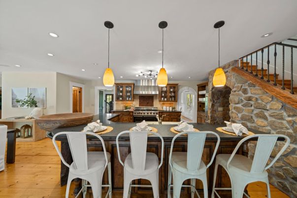 Interior, Kitchen, Pendant Lights, Recessed Lighting, Stainless Steel Appliances, Stone Walls, Wood Texture Flooring