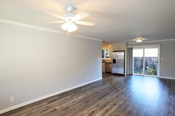 Empty room, Interior, Kitchen, Stainless Steel Appliances, Wood Texture Flooring