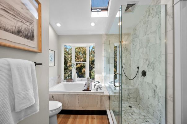 Bathroom, Glass Shower, Interior, Marble Walls, Recessed Lighting, Wood Texture Flooring
