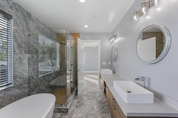 Bathroom, Dual Sink Vanities, Free Standing Baths, Glass Shower, Interior, Marble, Marble Walls, Recessed Lighting