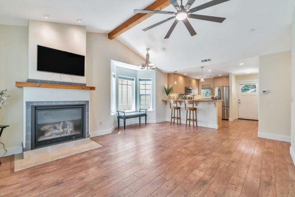 Fireplace, Interior, Kitchen, Pendant Lights, Recessed Lighting, Stainless Steel Appliances, Wooden Beams, Wood Texture Flooring