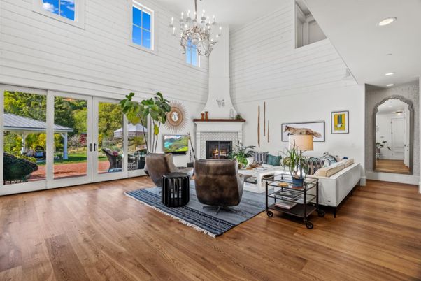 Chandelier, Fireplace, Interior, Living room, Pendant Lights, Recessed Lighting, Wood Texture Flooring
