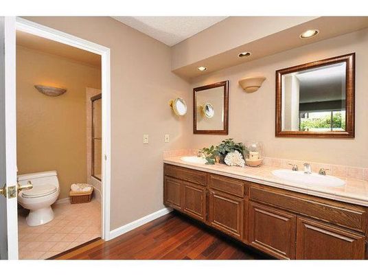 Bathroom, Dual Sink Vanities, Interior, Recessed Lighting, Wood Texture Flooring