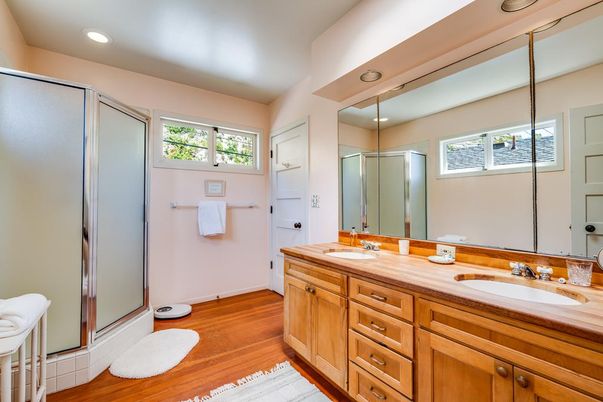 Bathroom, Dual Sink Vanities, Glass Shower, Interior, Recessed Lighting, Wood Texture Flooring