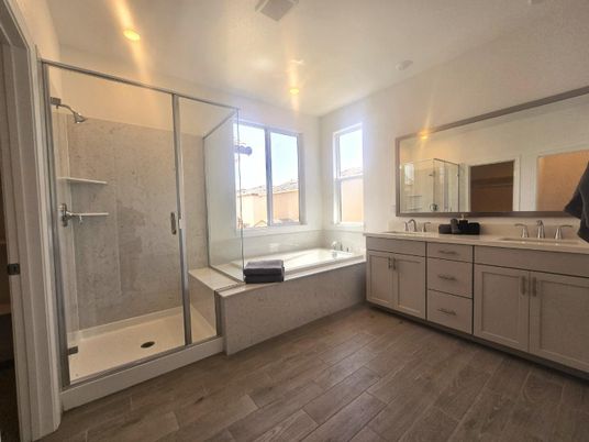Bathroom, Dual Sink Vanities, Glass Shower, Interior, Recessed Lighting, Wood Texture Flooring