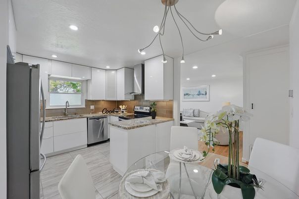 Dining room, Interior, Kitchen, Living room, Pendant Lights, Recessed Lighting, Stainless Steel Appliances, Wood Texture Flooring