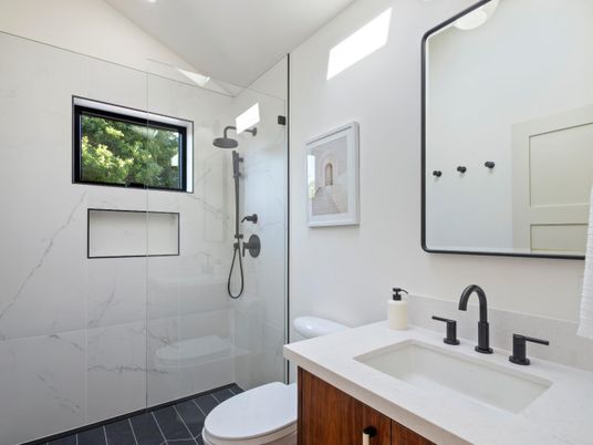 Bathroom, Dual Sink Vanities, Glass Shower, Interior, Marble Walls, Recessed Lighting