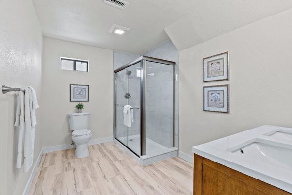 Bathroom, Glass Shower, Interior, Recessed Lighting, Wood Texture Flooring