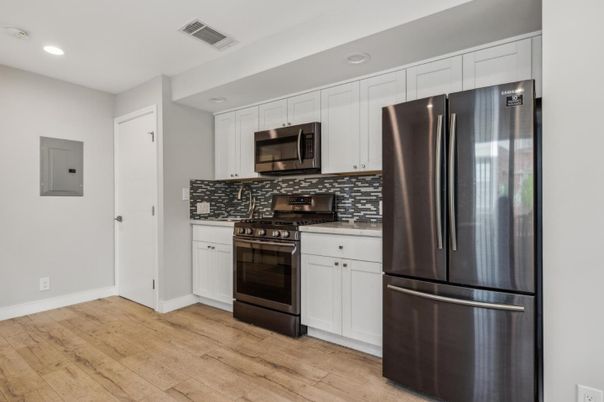 Interior, Kitchen, Recessed Lighting, Stainless Steel Appliances, Wood Texture Flooring